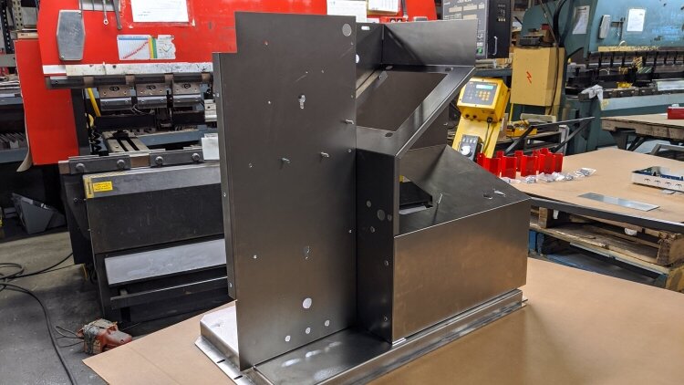 Misaligned holes in sheet metal assemblies